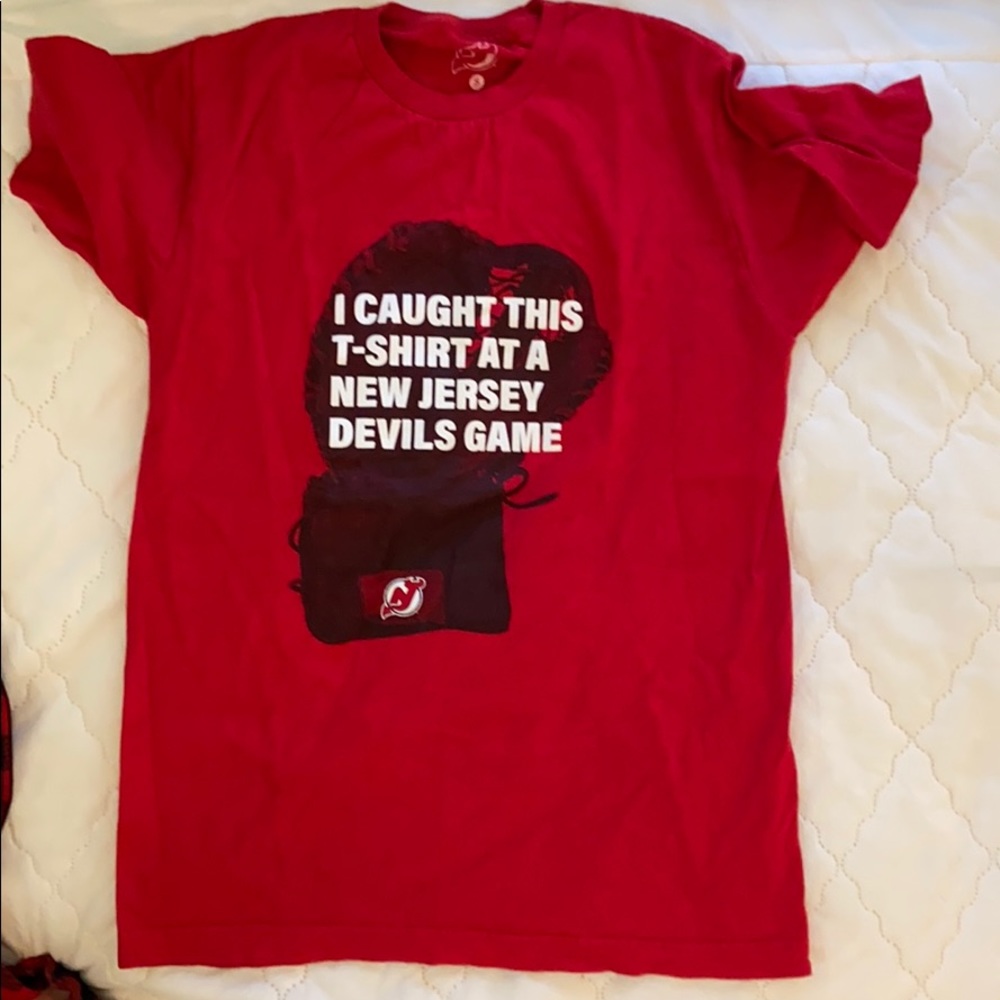 A Devils shirt. Caught at the game